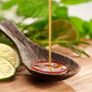 Erme being poured onto a spoon