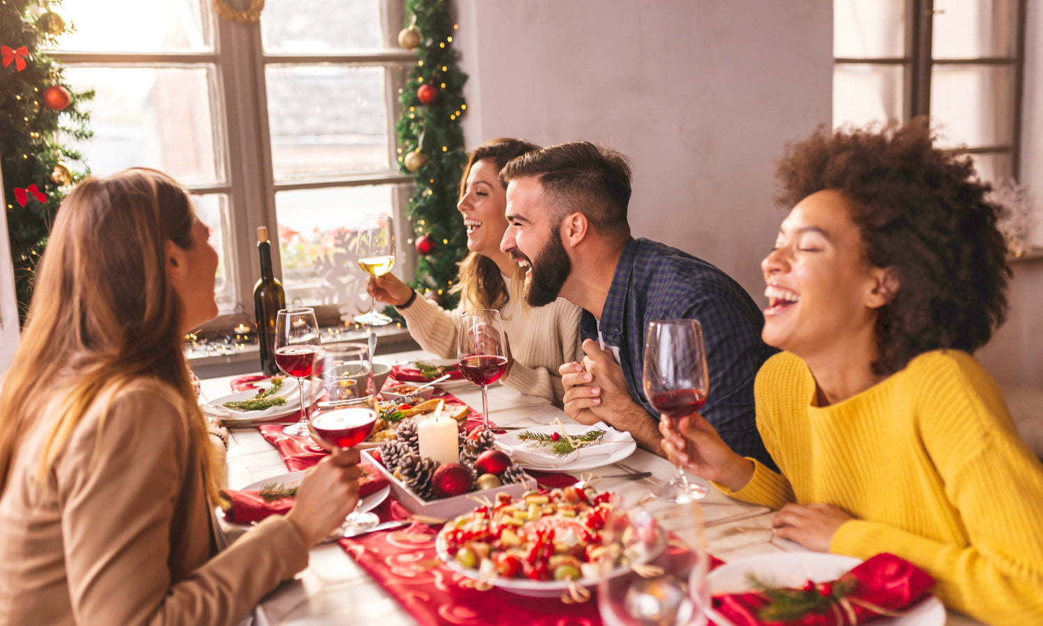 Friends eating Christmas dinner