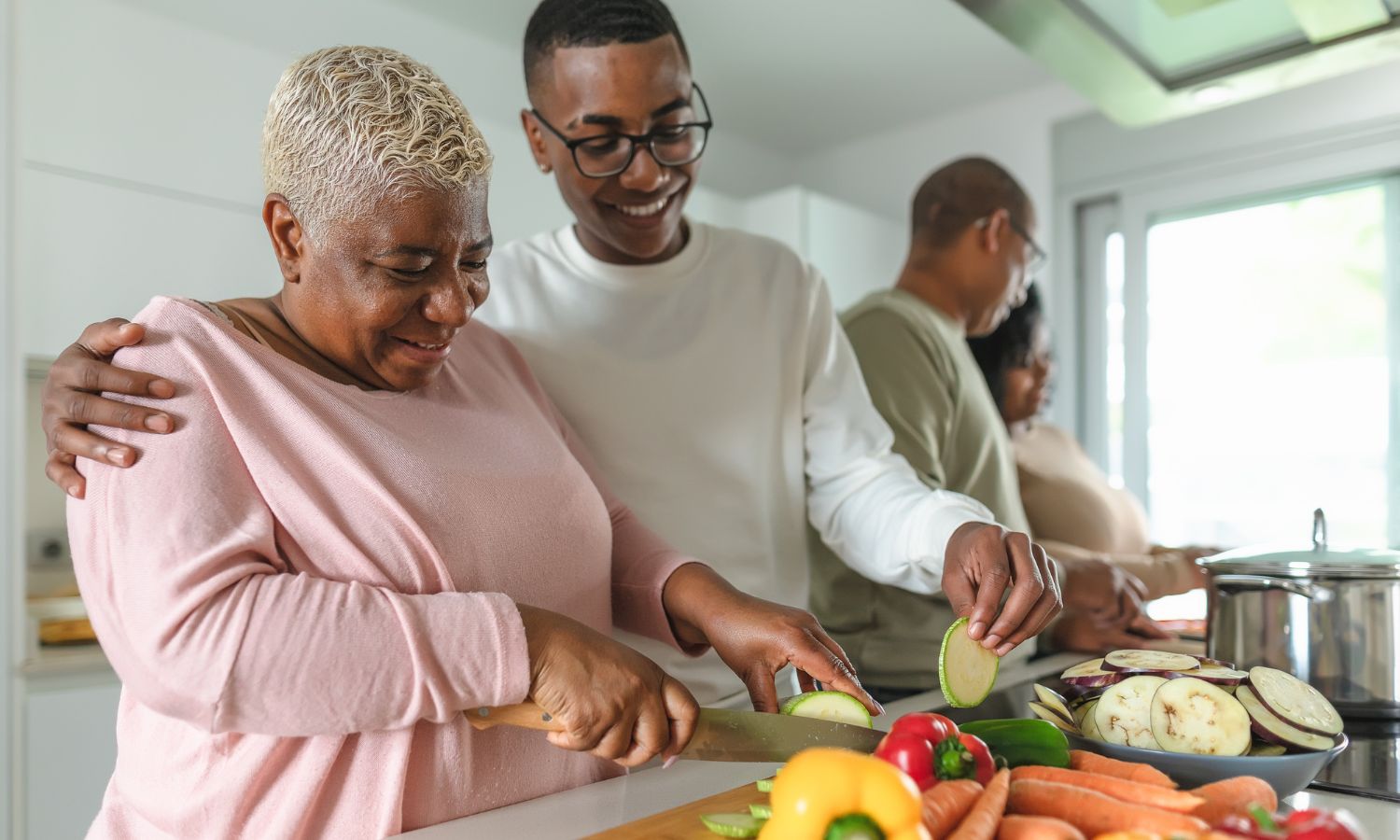 People cutting vegetables