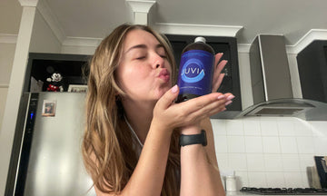 lady kissing juvia bottle