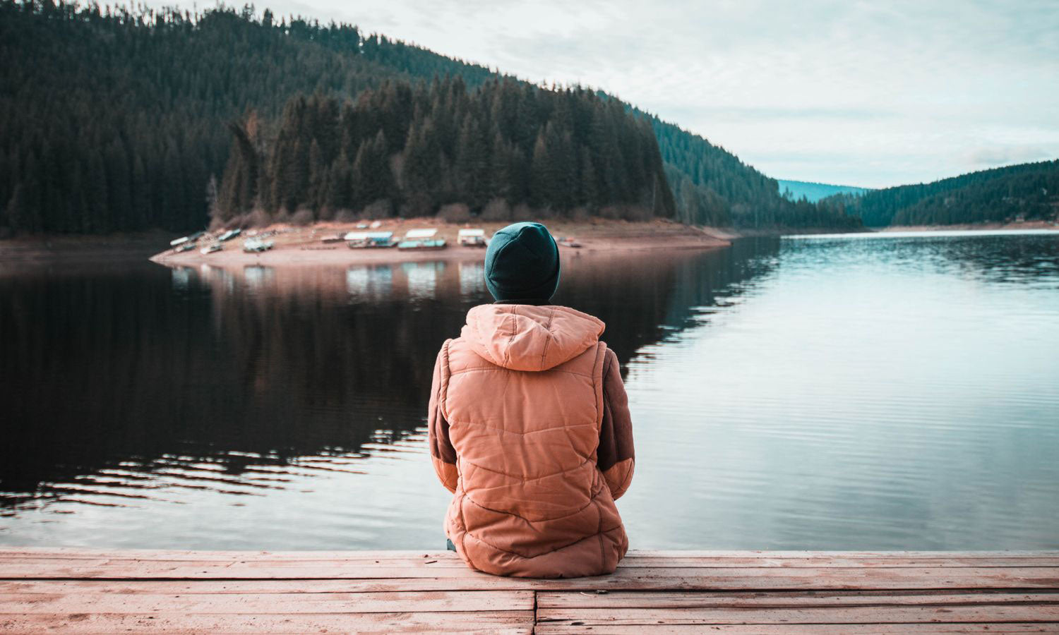 Person at next to a river