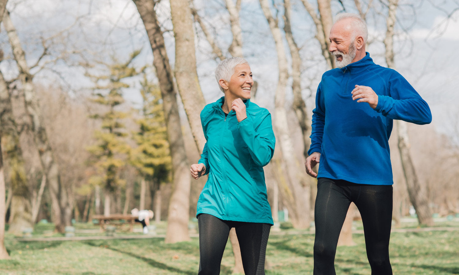 Older man and women walking