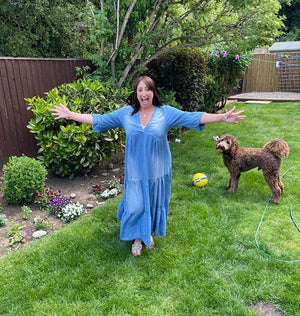 Melissa and her dog in the garden